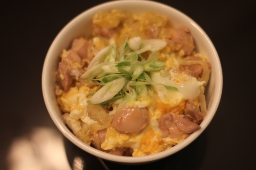 A dish made with chicken, eggs, onions, sake and mirin